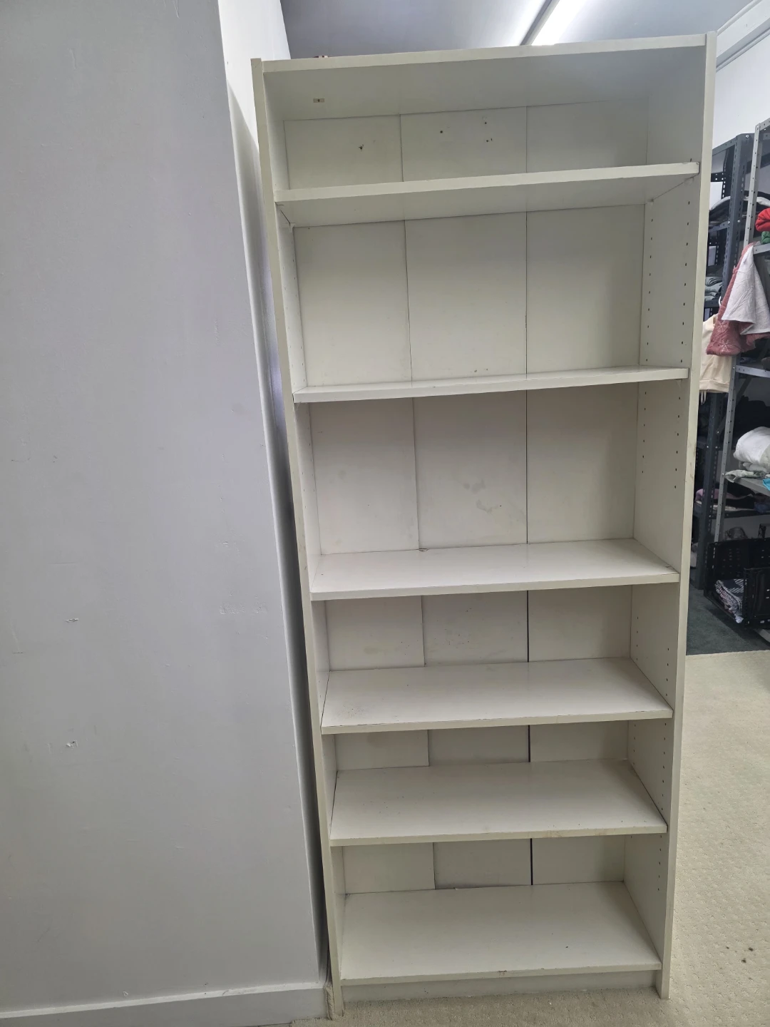White tall bookcase with adjustable shelves - photo 3