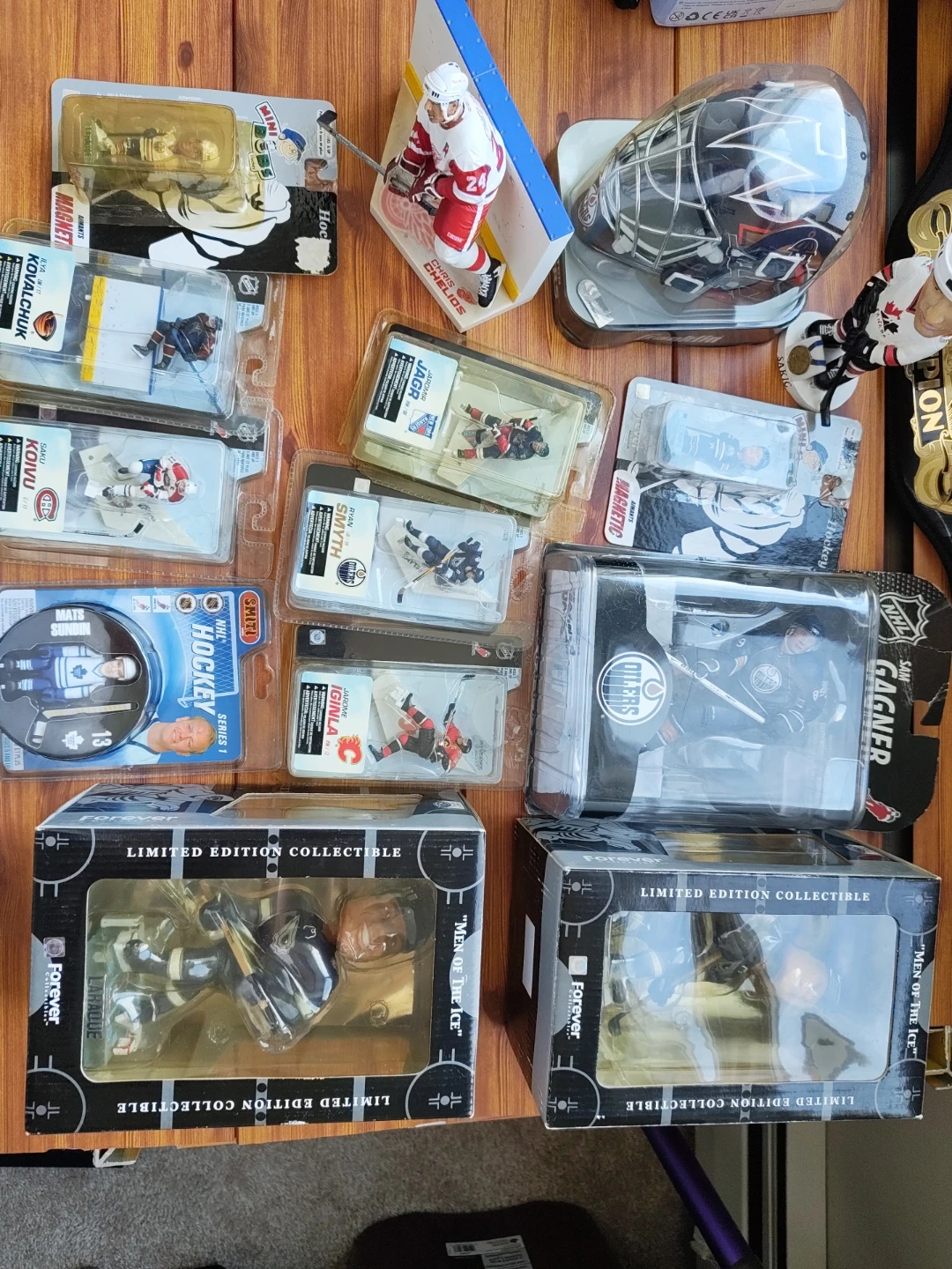 Collection of NHL Hockey Figurines and Bobbleheads