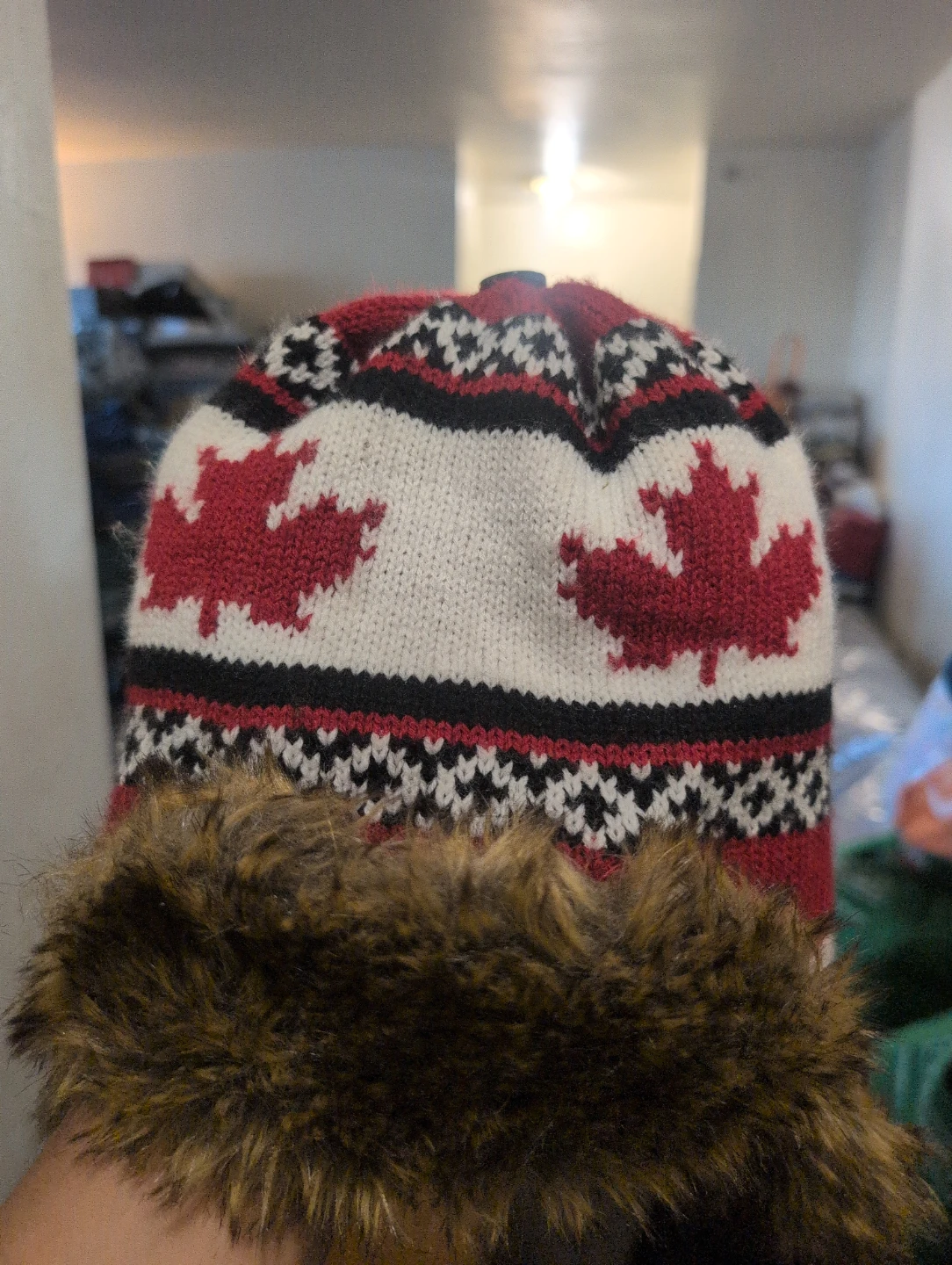 Red and white Canada maple leaf trapper hat