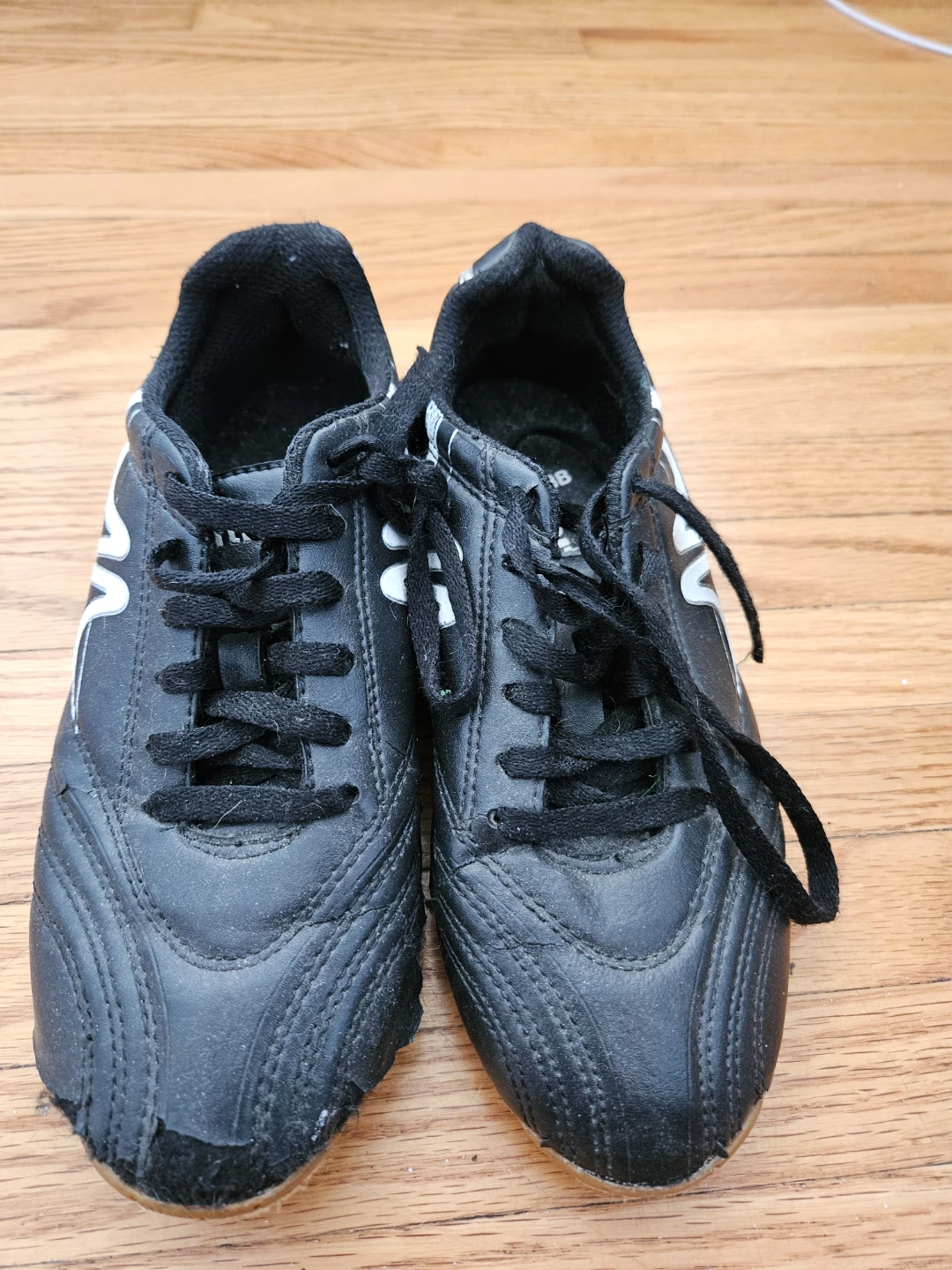 New Balance Black Soccer Shoes
