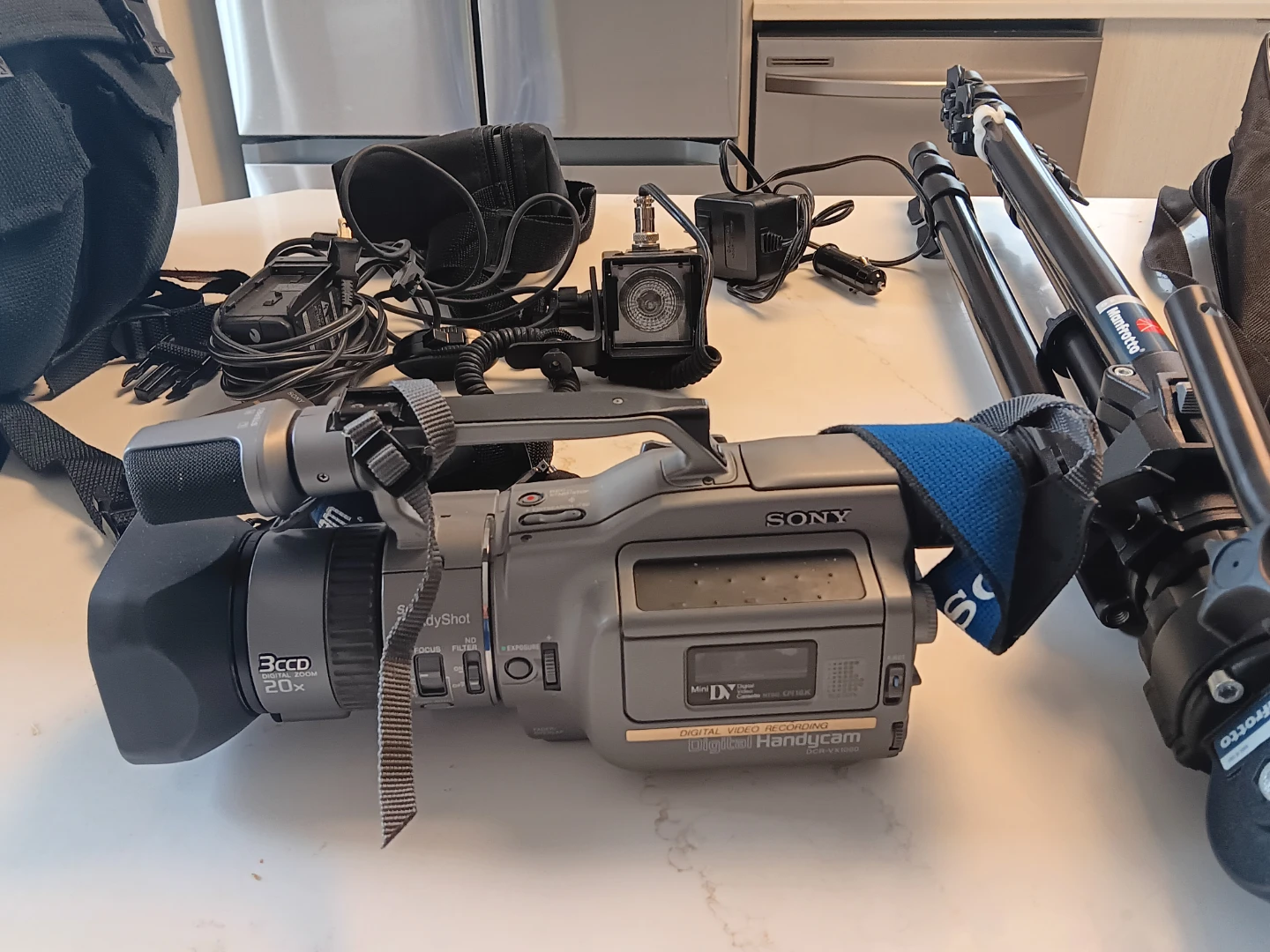 Sony DCR-VX1000 MiniDV camcorder with tripod