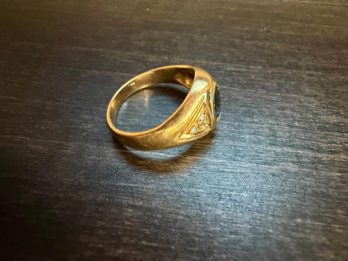 18k gold natural diamond & unknown center stone ring.