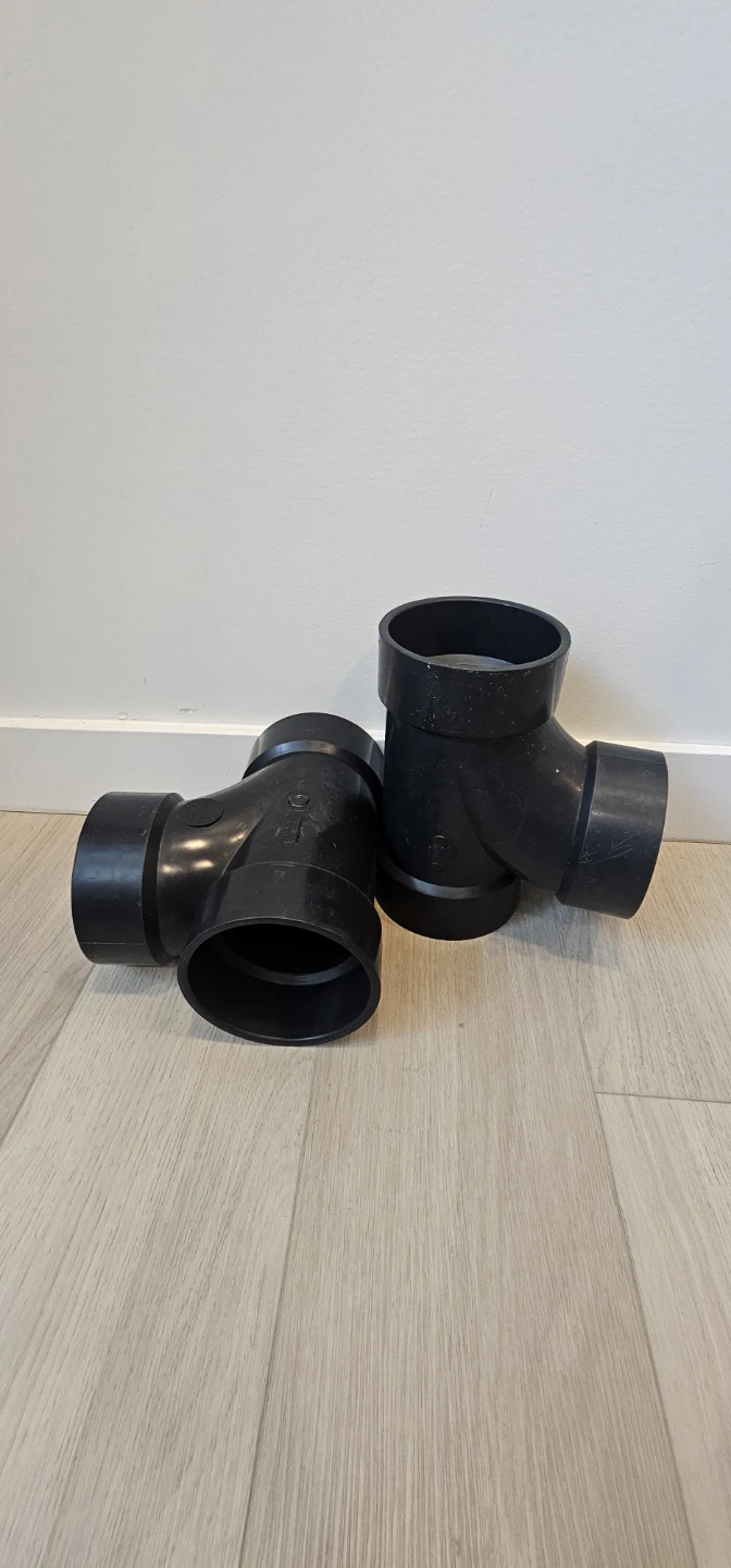 Two 4-inch ABS Tee Pipe Fittings