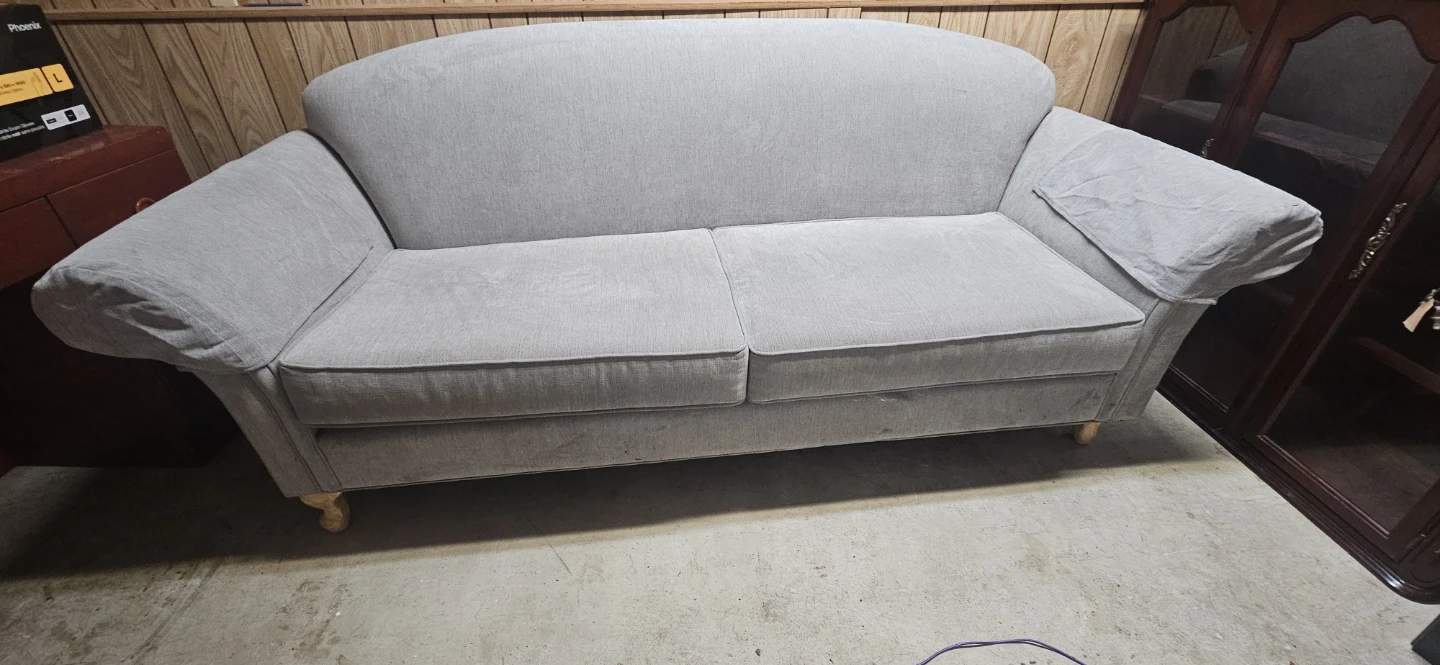 Light grey two-seater sofa