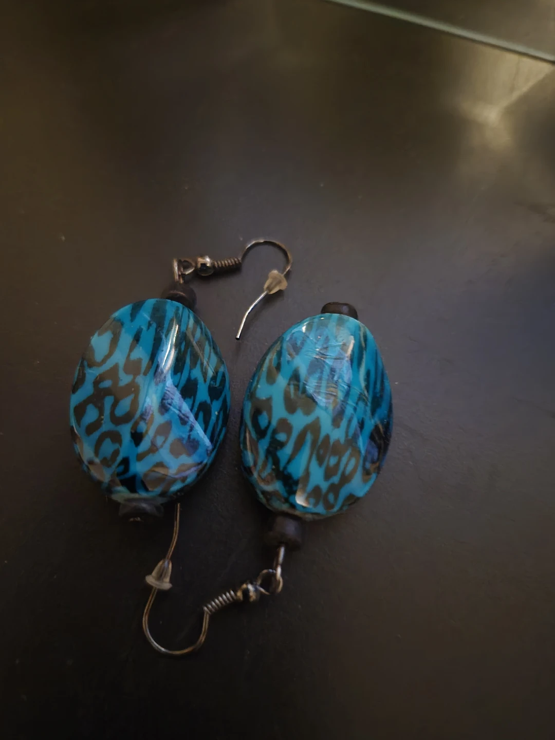 Blue and black patterned glass earrings