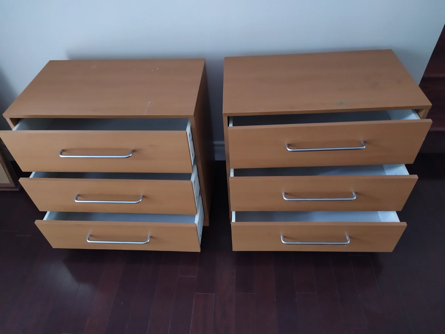 Two Wood-Finish Three-Drawer Bedside Tables