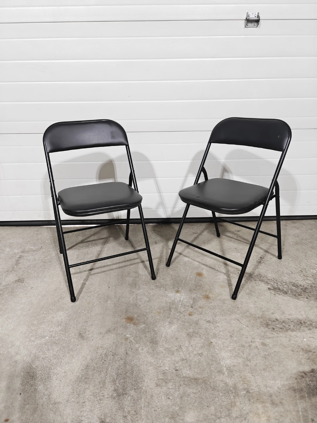 Black folding chairs $10 each