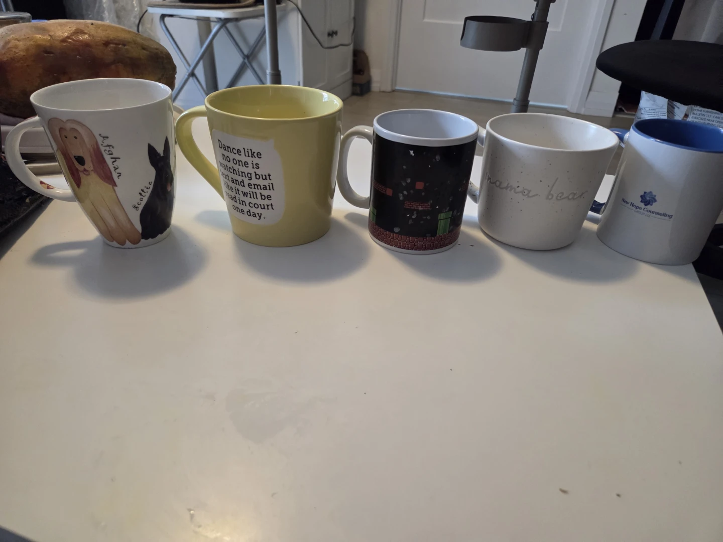 Assorted collection of 5 unique mugs