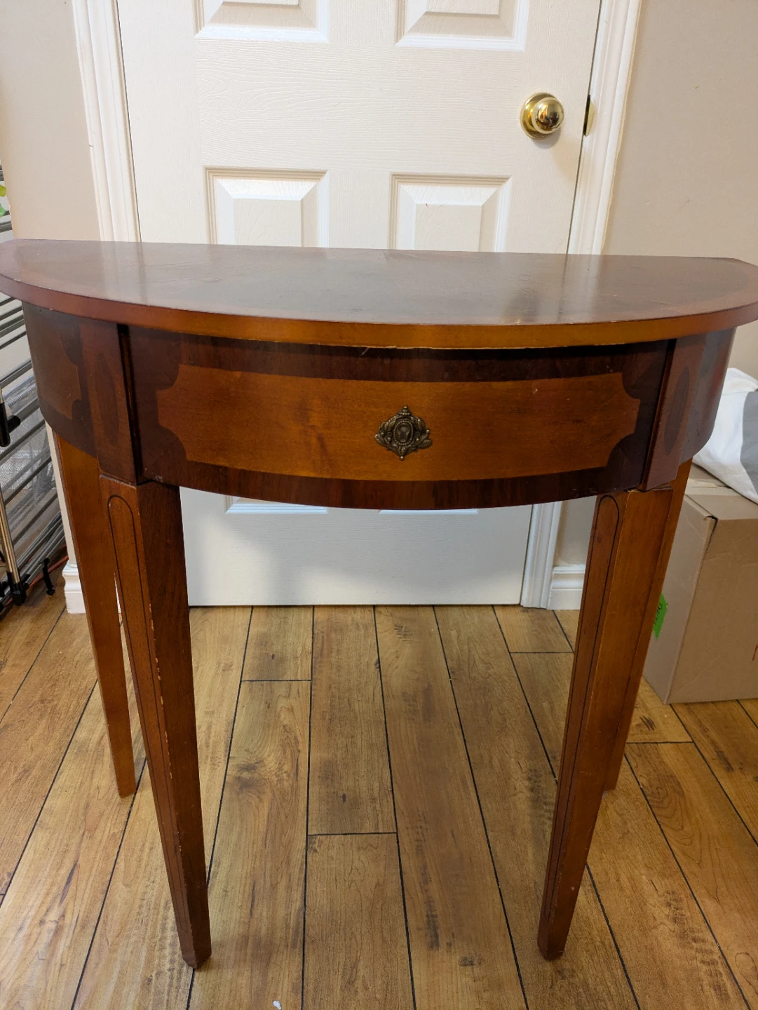 Half-moon wooden accent table