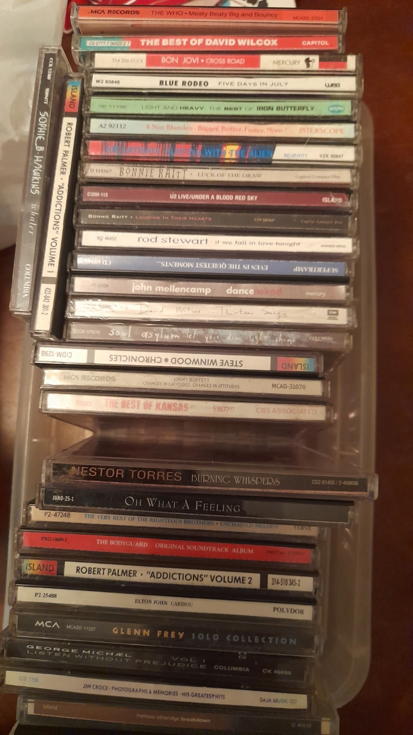 Large collection of assorted music CDs