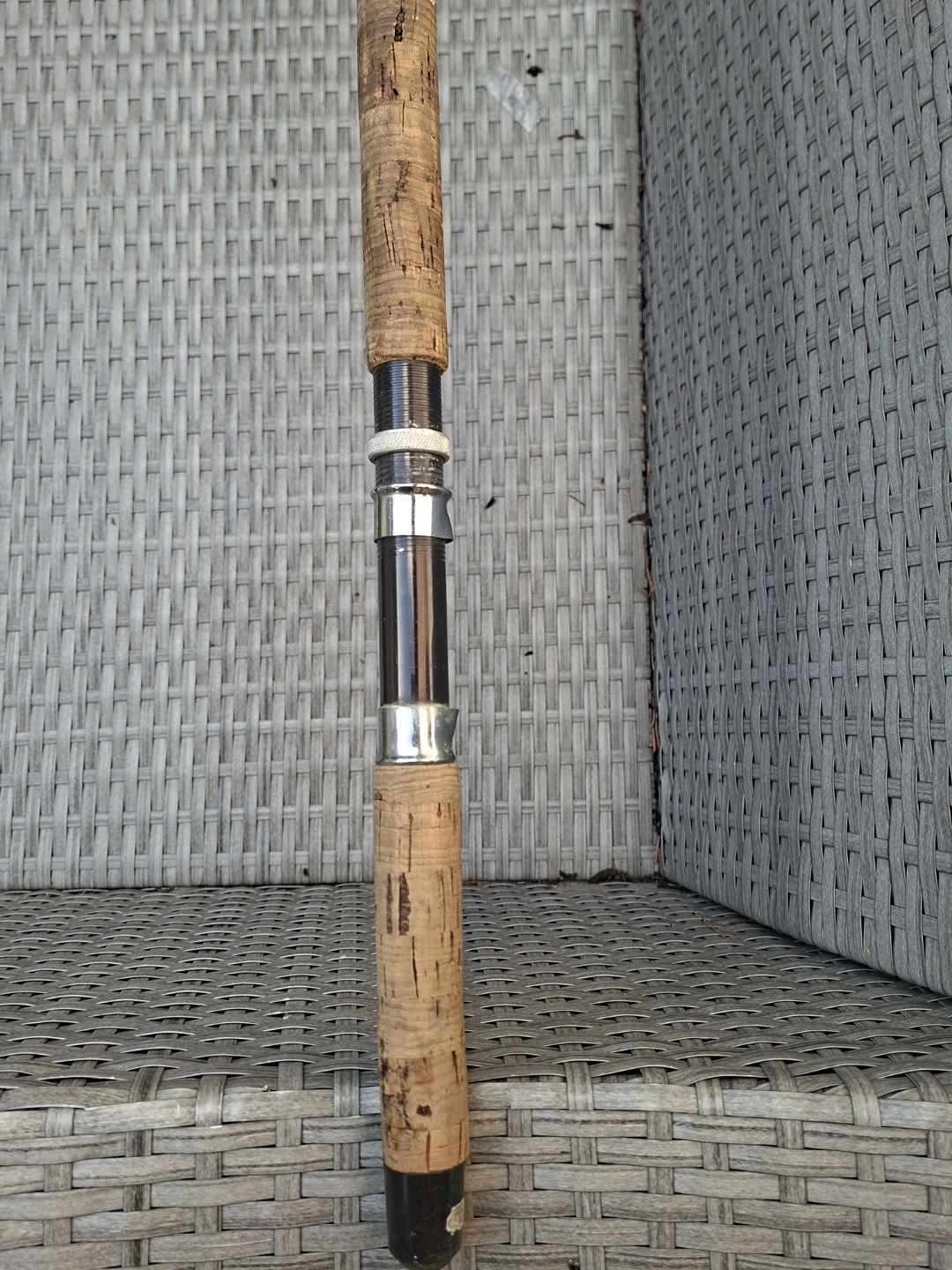 Vintage two-piece fishing rod with cork handle