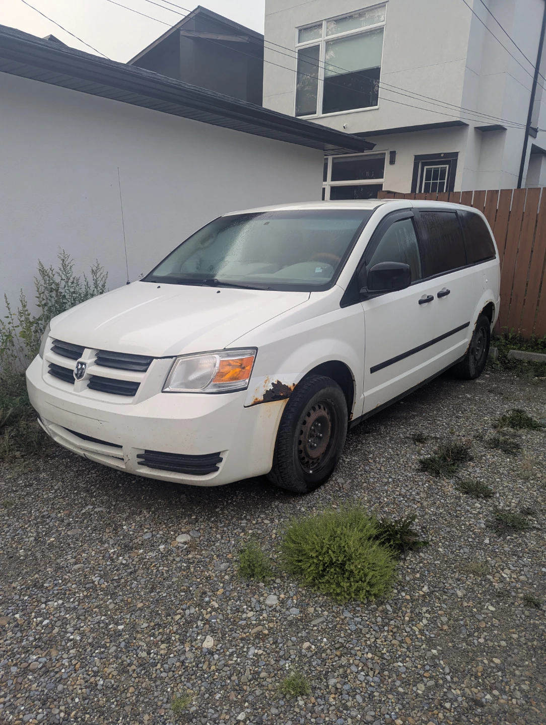 White Dodge Grand Caravan