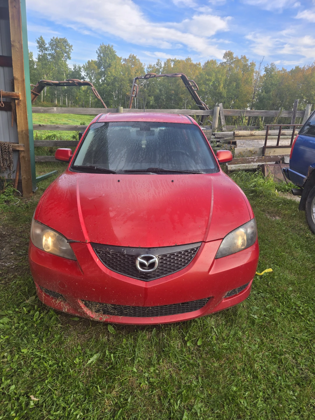 Red Mazda Sedan