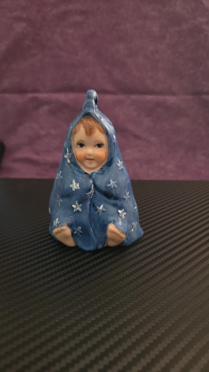 Ceramic baby bell figurine