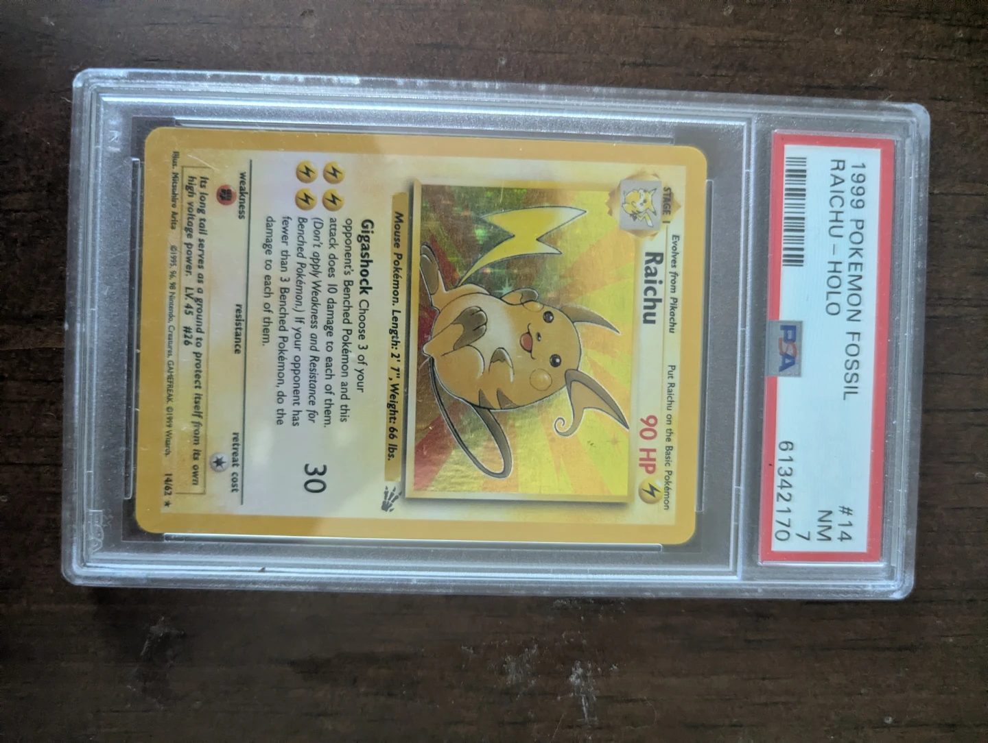 1999 Pokemon Fossil Raichu Holo PSA 7