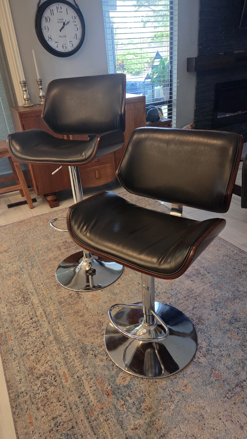 Two Brown Adjustable Swivel Bar Stools