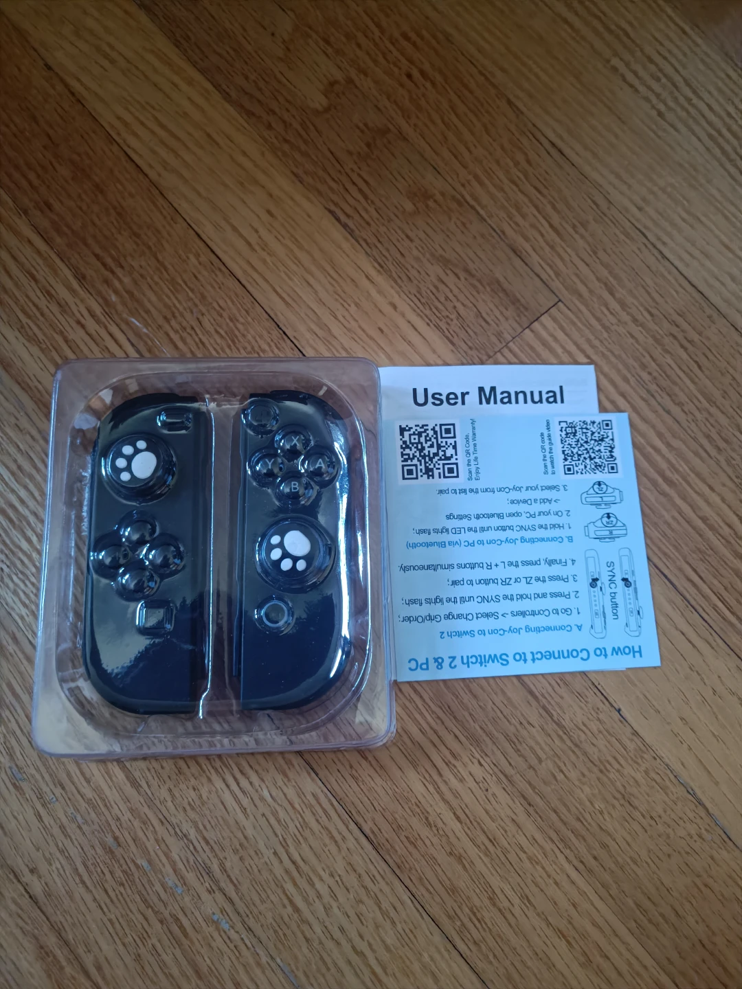Black Joy-Con Controllers with Paw Print Thumb Grips - photo 3