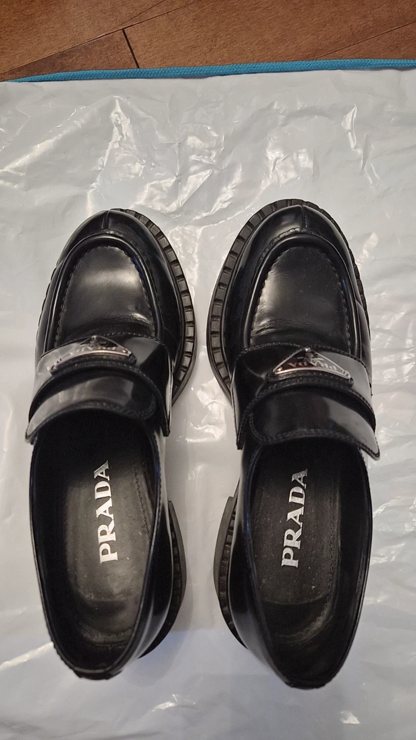 Prada black leather loafers