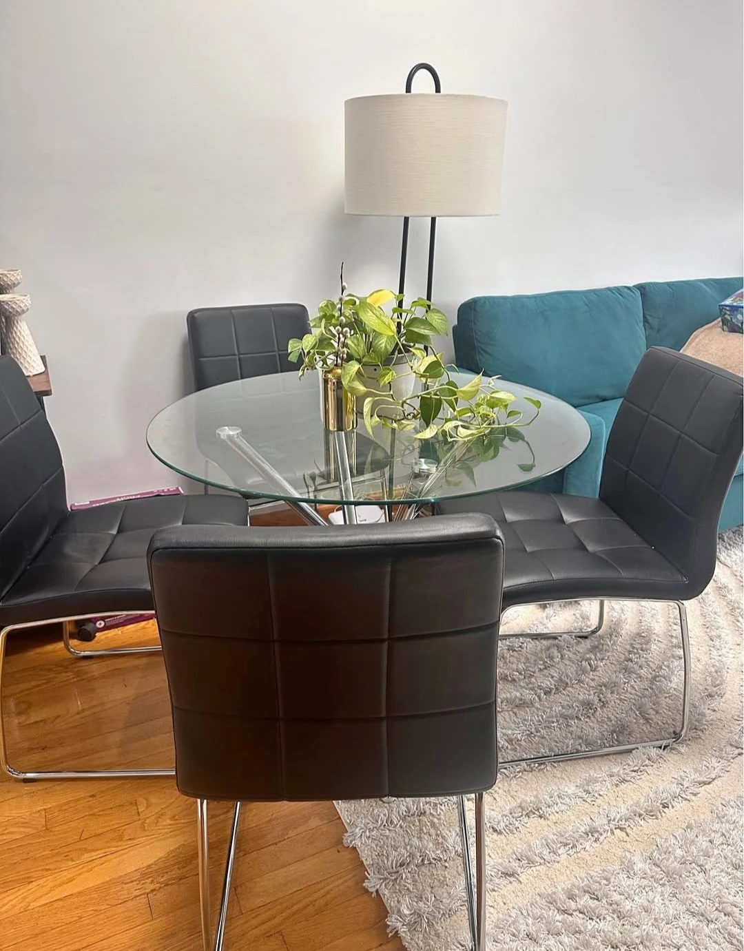 Almost new set of 4 dining chairs with like new glass table