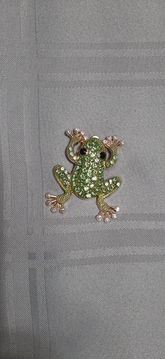 Gold tone Frog Brooch with green stones.