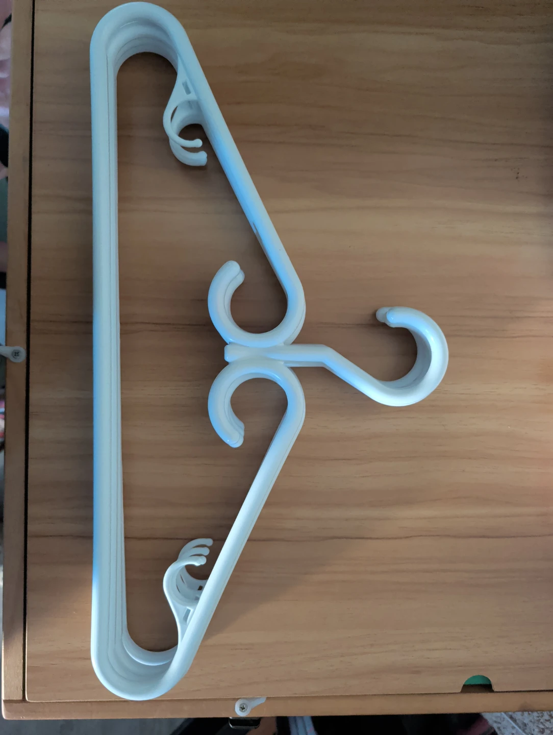 4 White Plastic Clothing Hangers