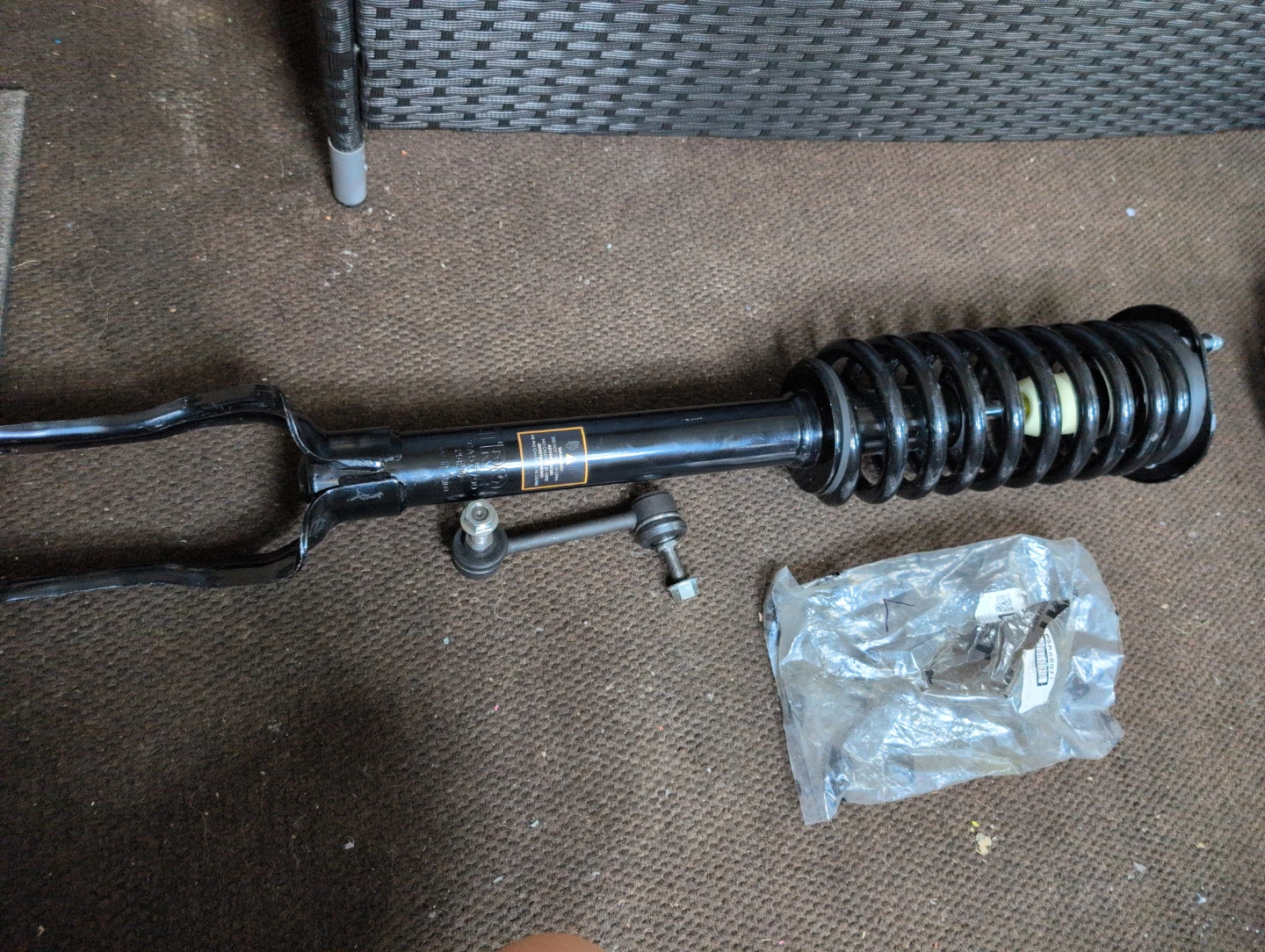 Driver side  LF TRQ Strut and Spring Assembly sway bar link