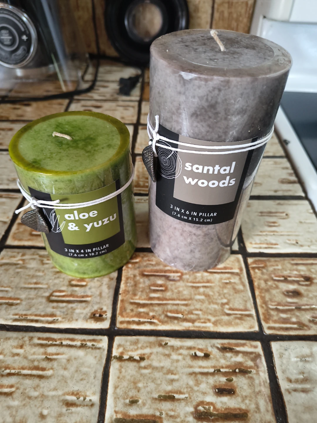 Two Alaura Candles: Aloe & Yuzu and Santal Woods