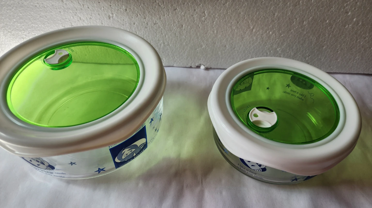 Two Glass Storage Containers
