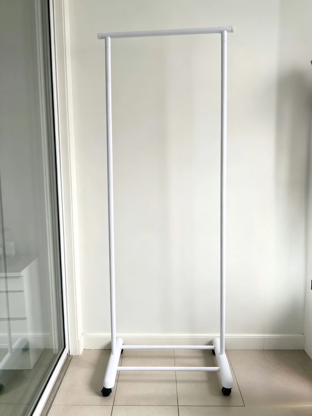 White Metal Clothing Rack on Wheels