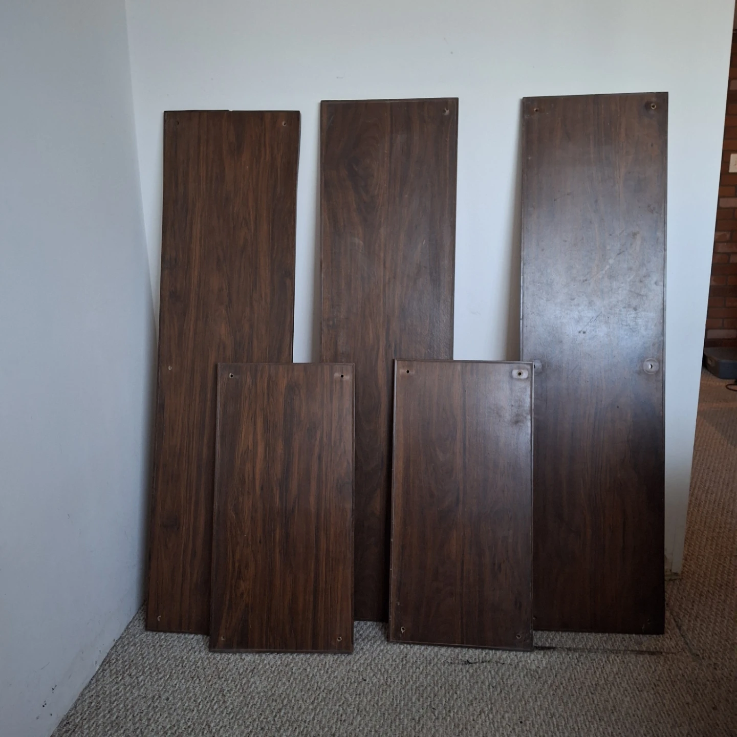 Disassembled cabinet shelving unit