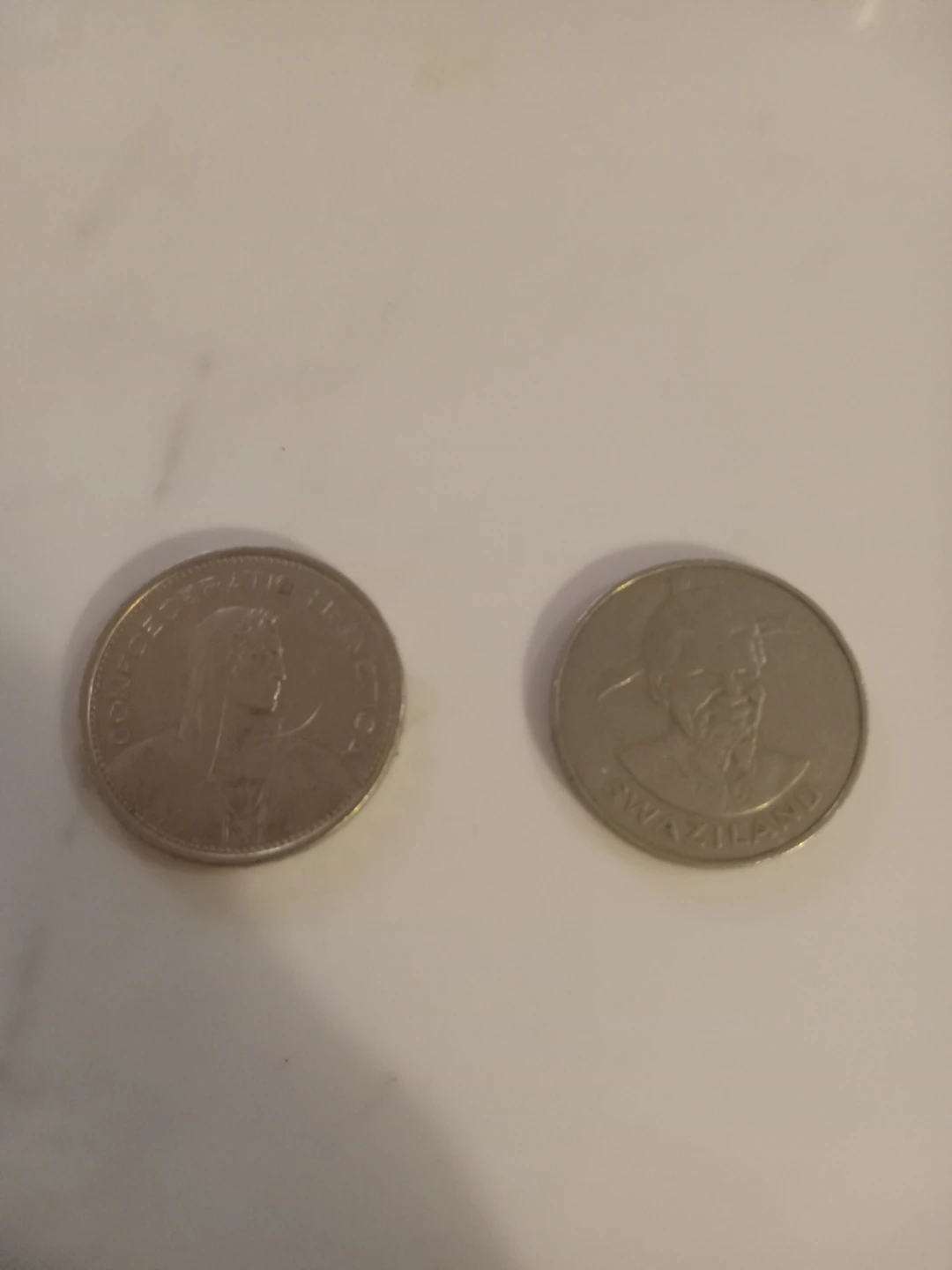 Two collectible world coins