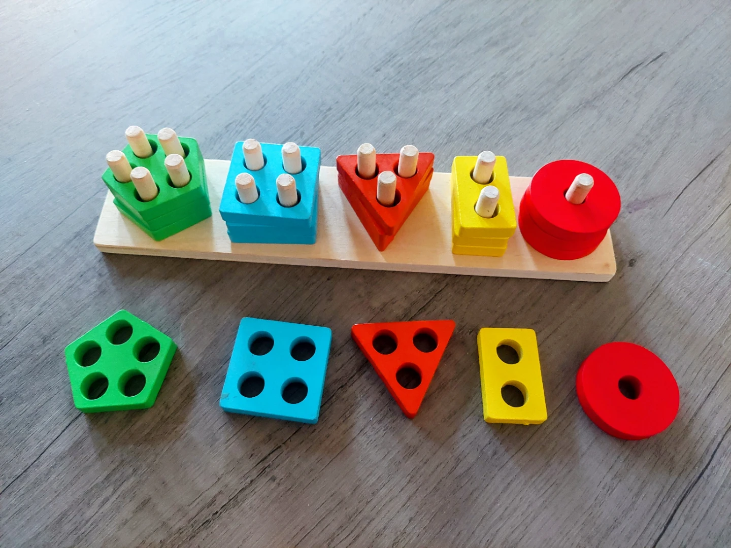 Wooden shape sorting toy