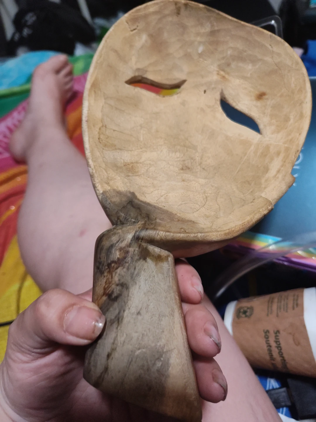 Hand-carved wooden face sculpture - photo 2