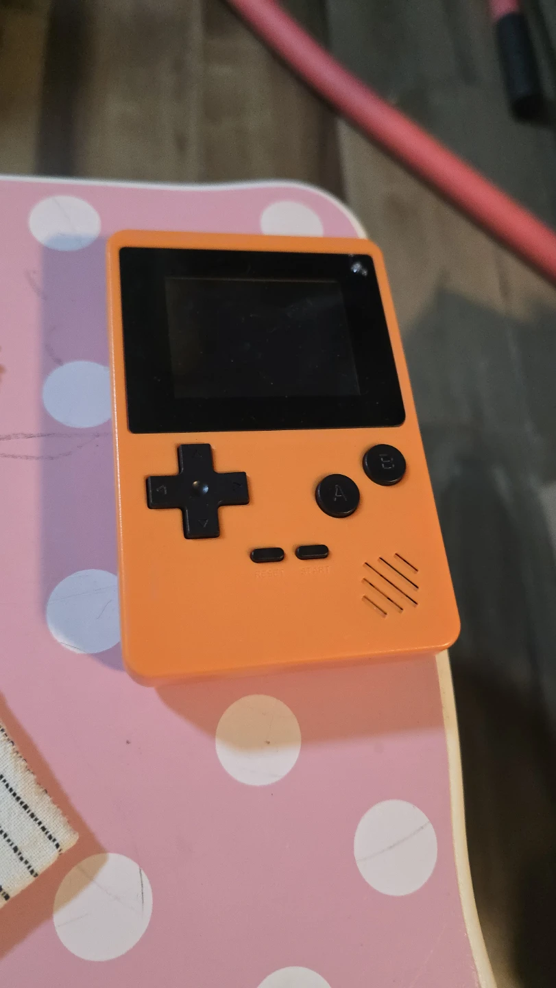 🏈 Orange Handheld Game Console