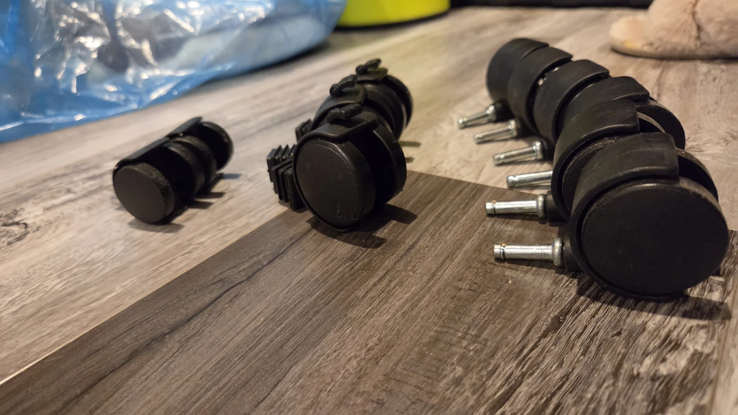Used black caster wheels with metal stems - photo 2