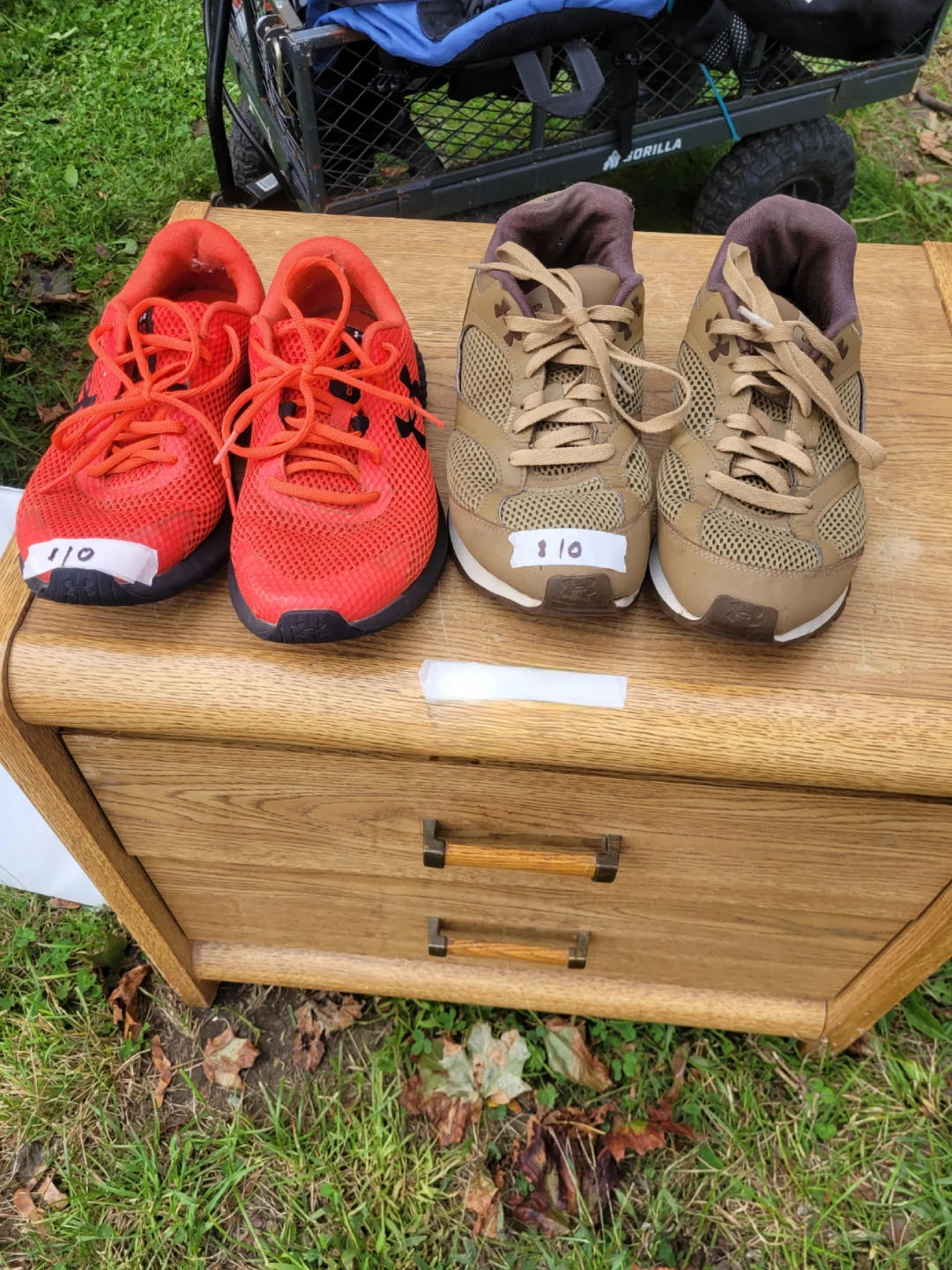 Under Armour Shoes and Wooden Night Table