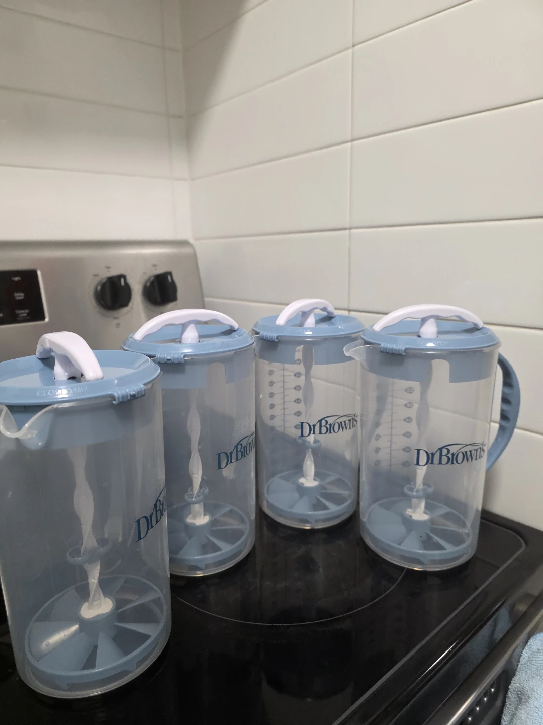 Four Dr. Brown's Formula Mixing Pitchers
