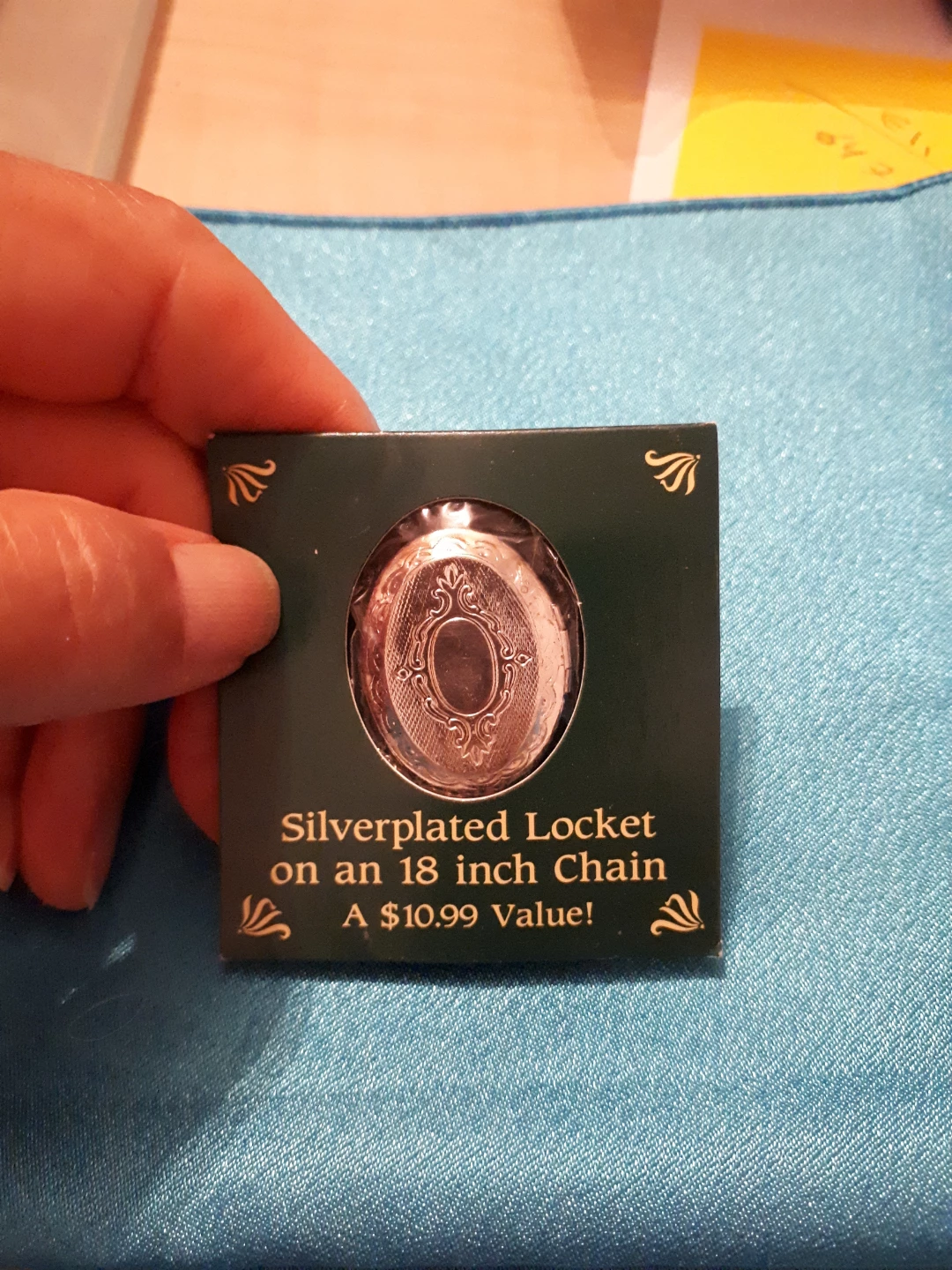 Silver-plated locket on 18 inch chain