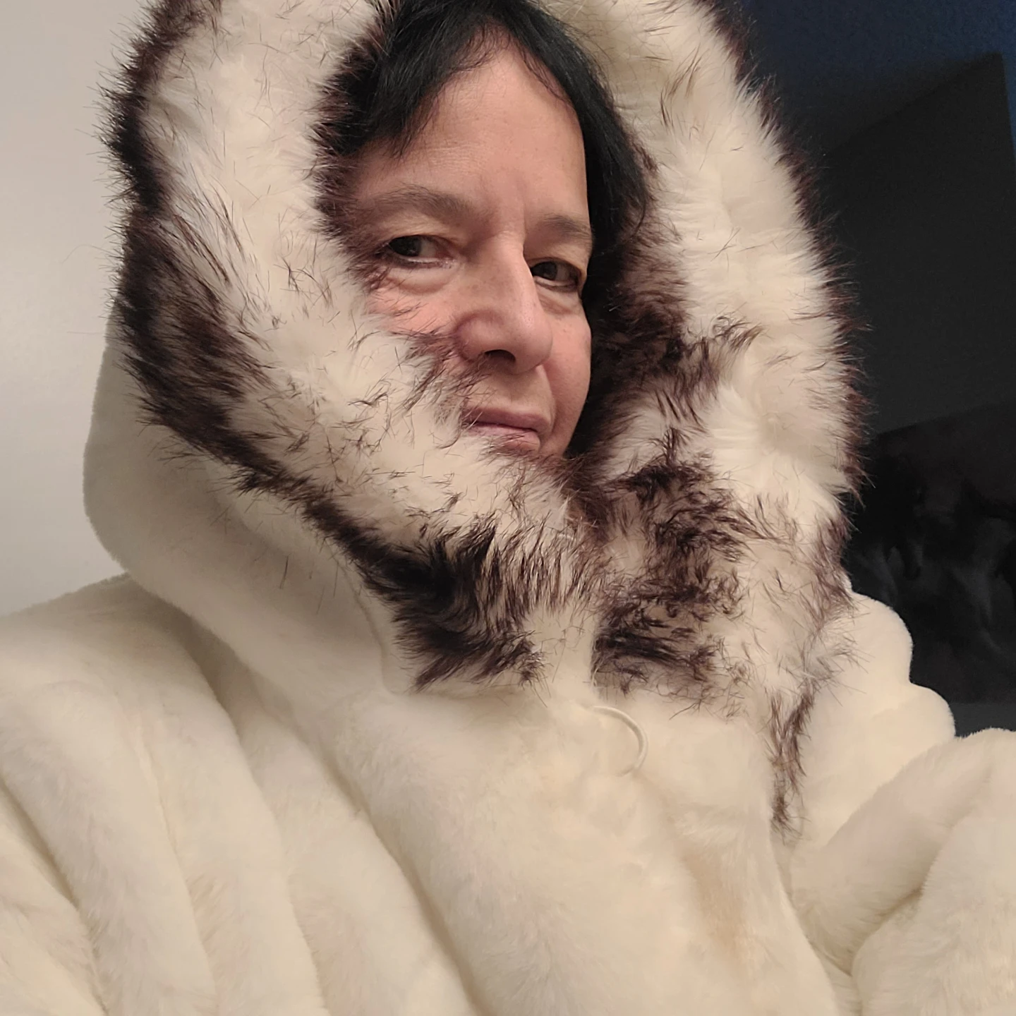 White faux fur parka with hood