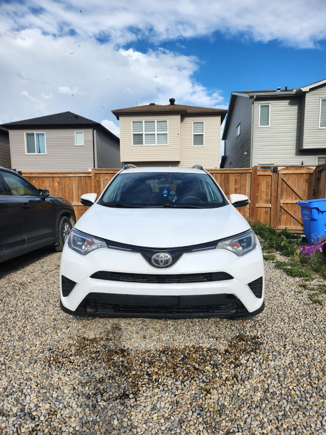 White Toyota RAV4 LE AWD