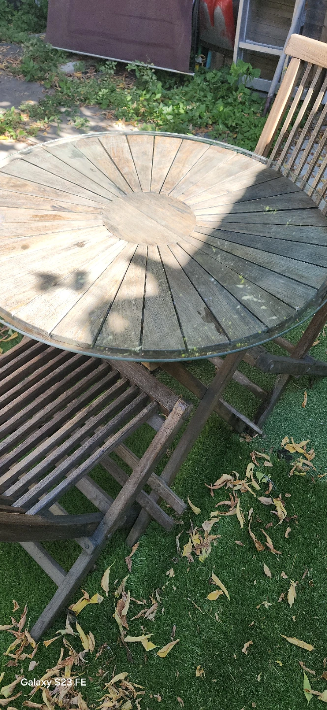 Teak bistro set with folding chairs and glass-top table - photo 4