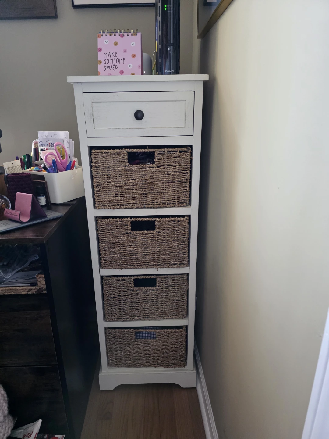 White Storage Cabinet with Four Wicker Baskets