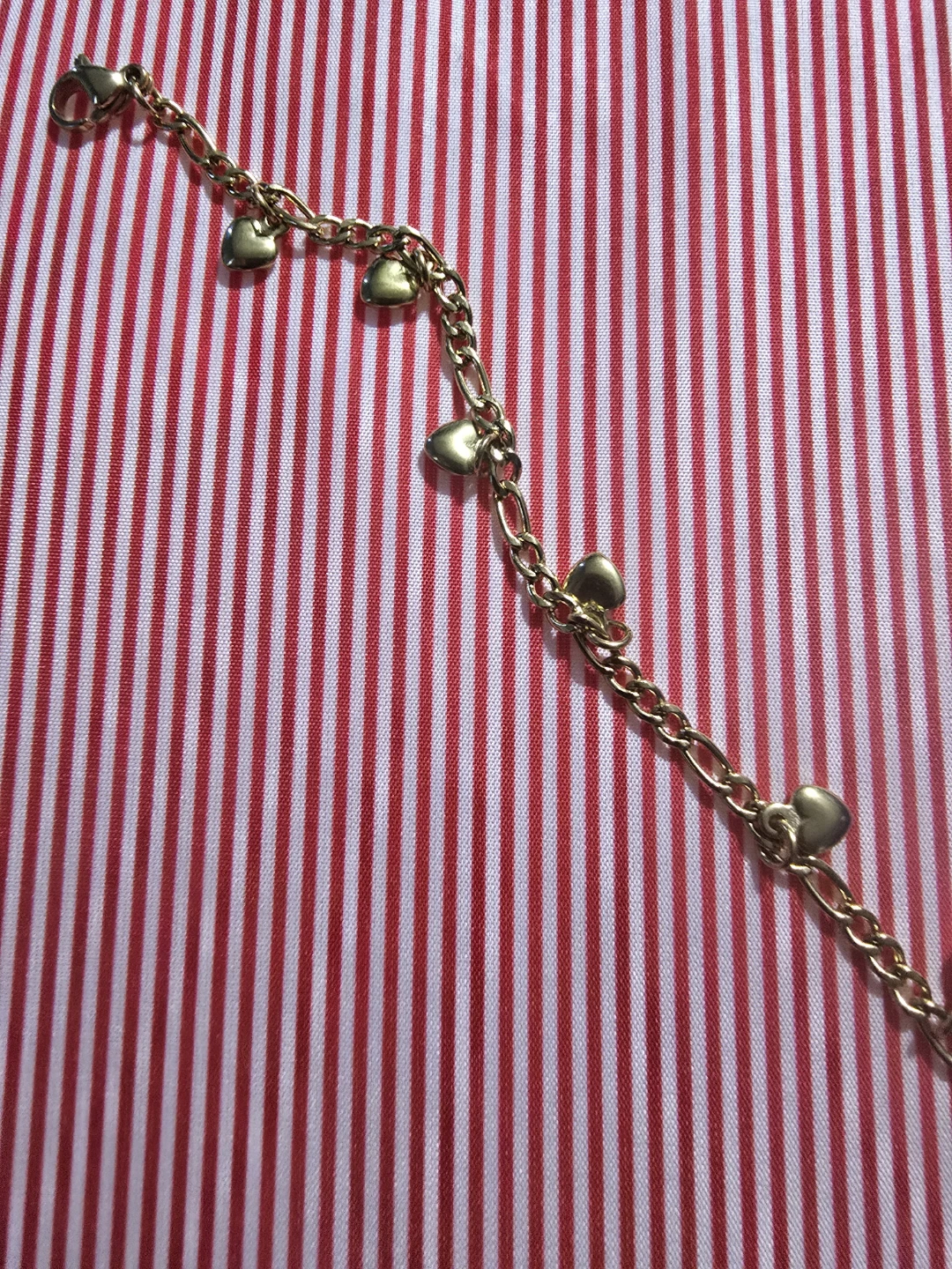Gold-tone heart charm bracelet