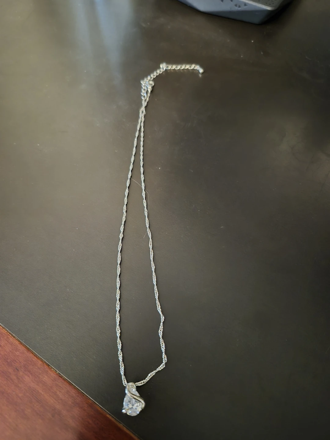 Silver-toned chain necklace with teardrop pendant