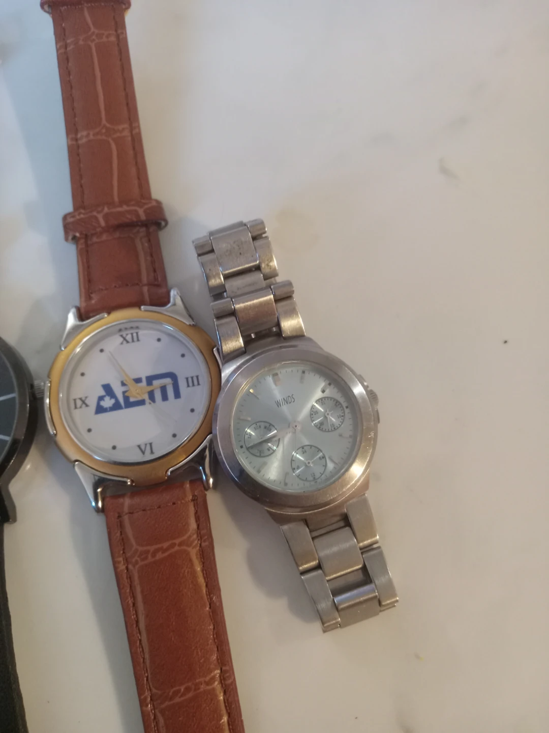 Set of three assorted wristwatches