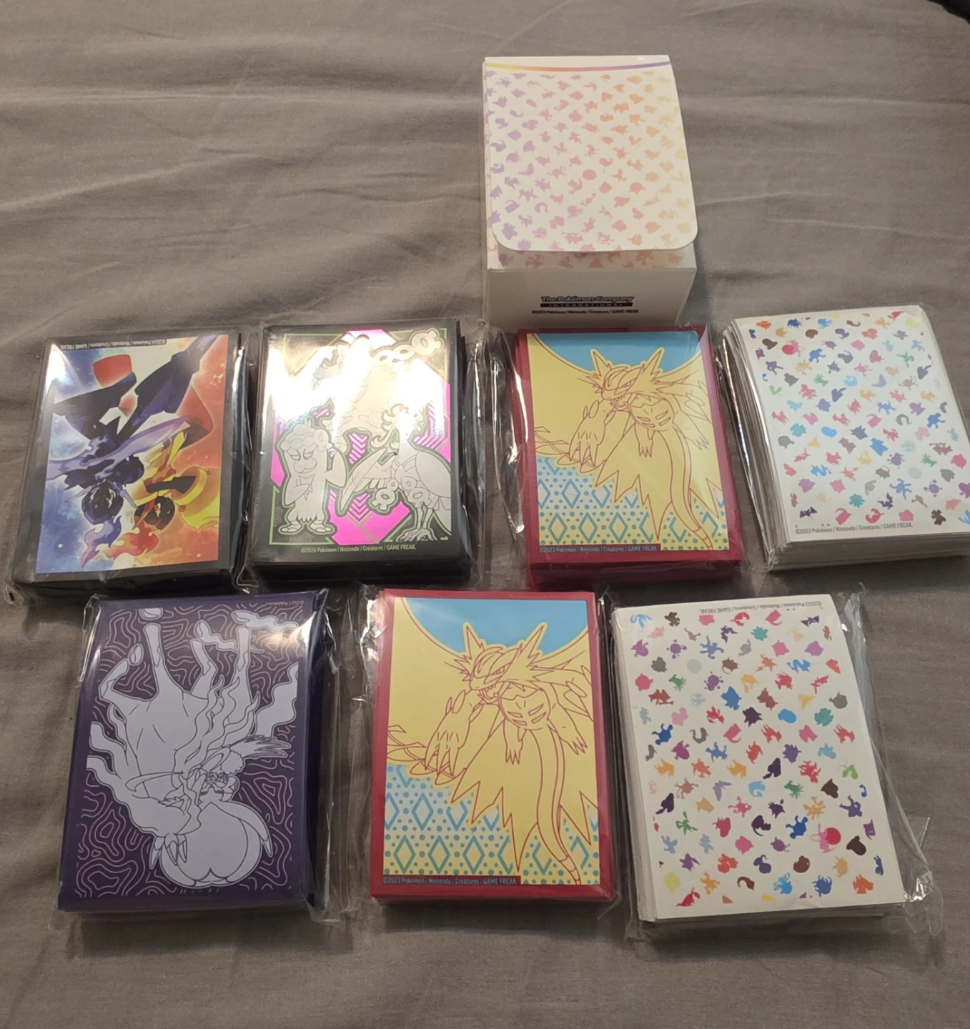 Lot of 7 Assorted Pokemon Trading Card Game Sleeves