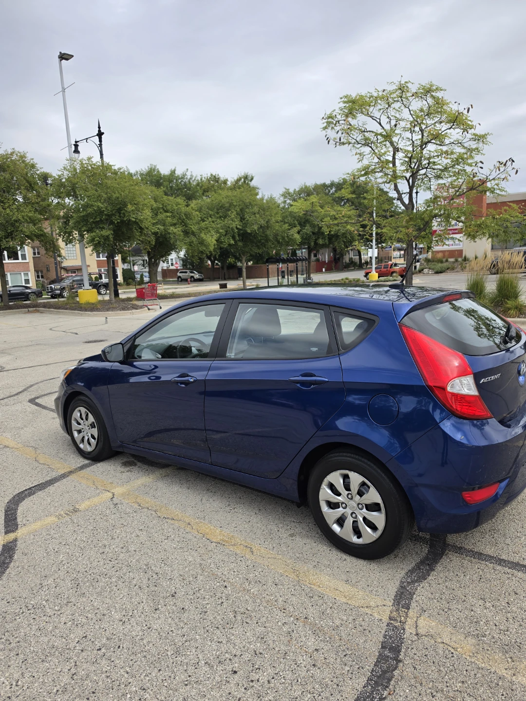 Blue Hyundai Accent Hatchback - photo 4