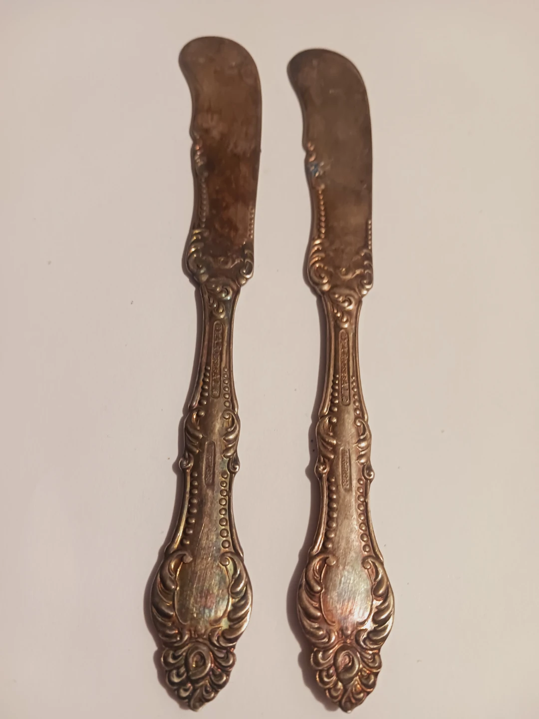 Two Antique 1920s Rogers Silver Butter Knives