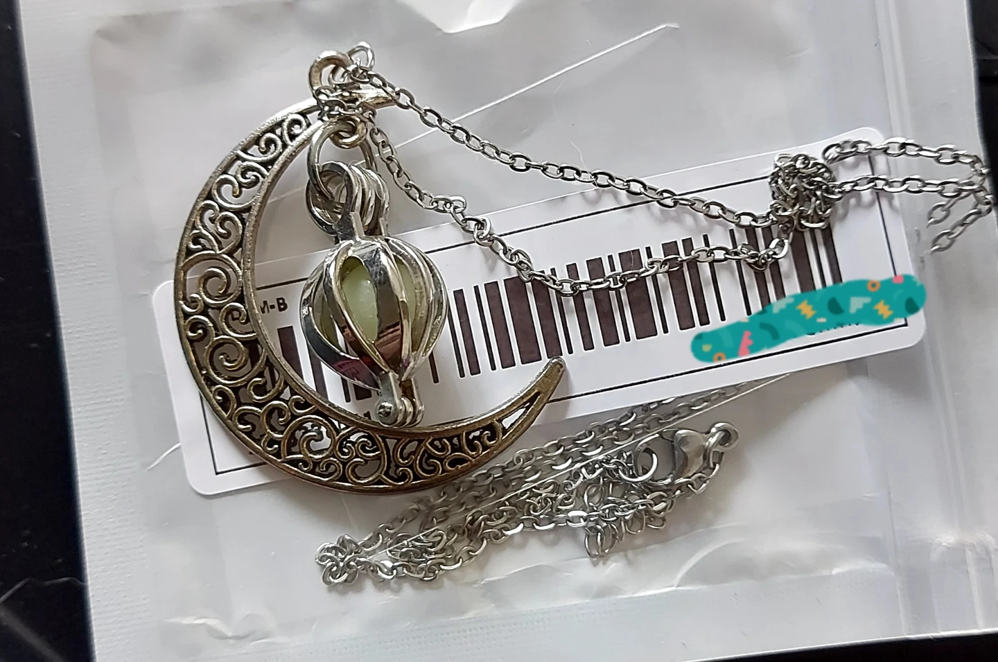 Crescent Moon and Cage Glow Necklace