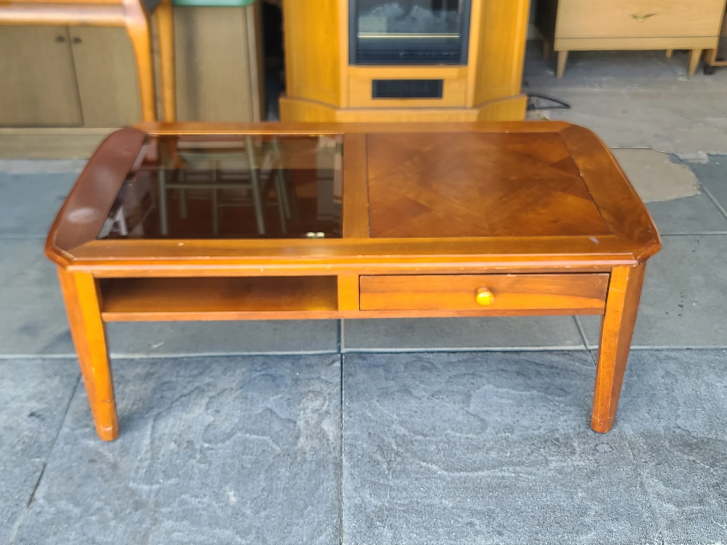 Wood coffee table with glass insert and drawer